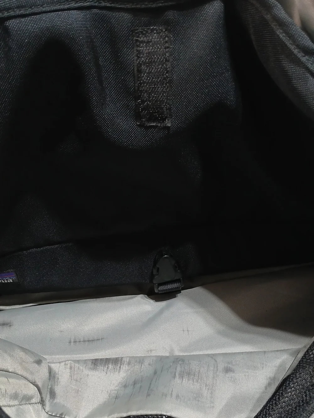 The Patagonia Half Mass Messenger Bag with Gray Reflective Trim Unisex